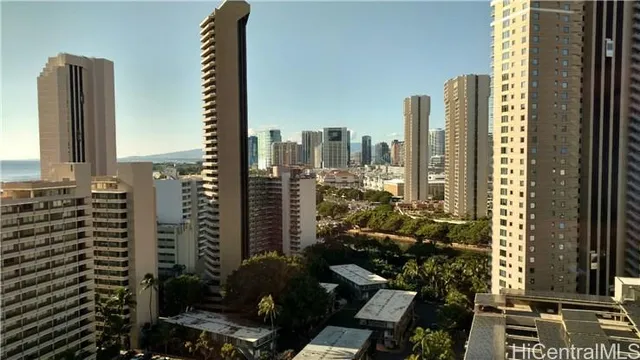 a view of city with tall buildings