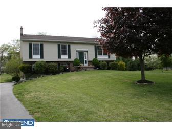 145 Old Spring Road West Brandywine, PA 19320 - Photo 1 of 12 a house view with a garden space