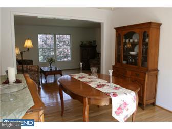 145 Old Spring Road West Brandywine, PA 19320 - Photo 4 of 12 a view of a dining room with furniture and chandelier