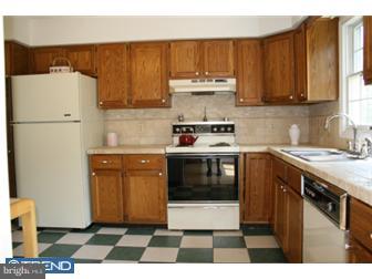 145 Old Spring Road West Brandywine, PA 19320 - Photo 5 of 12 a kitchen with a cabinets and white appliances