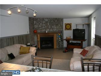 145 Old Spring Road West Brandywine, PA 19320 - Photo 9 of 12 a living room with furniture and a fireplace