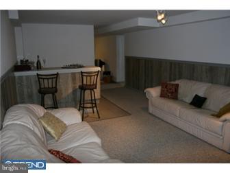 145 Old Spring Road West Brandywine, PA 19320 - Photo 10 of 12 a living room with furniture and a rug