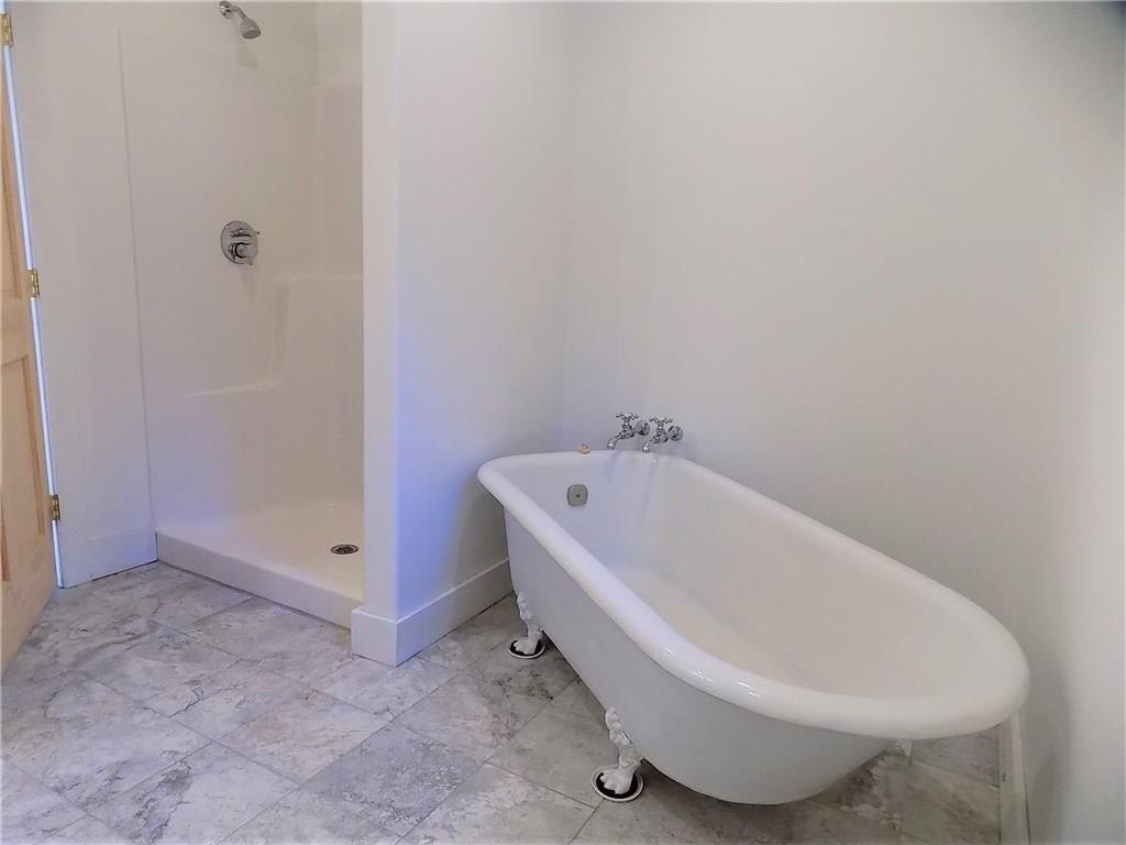 29 Apple Tree Way Ellsworth, ME 04605 - Photo 18 of 35 The master baths soaking tub and...