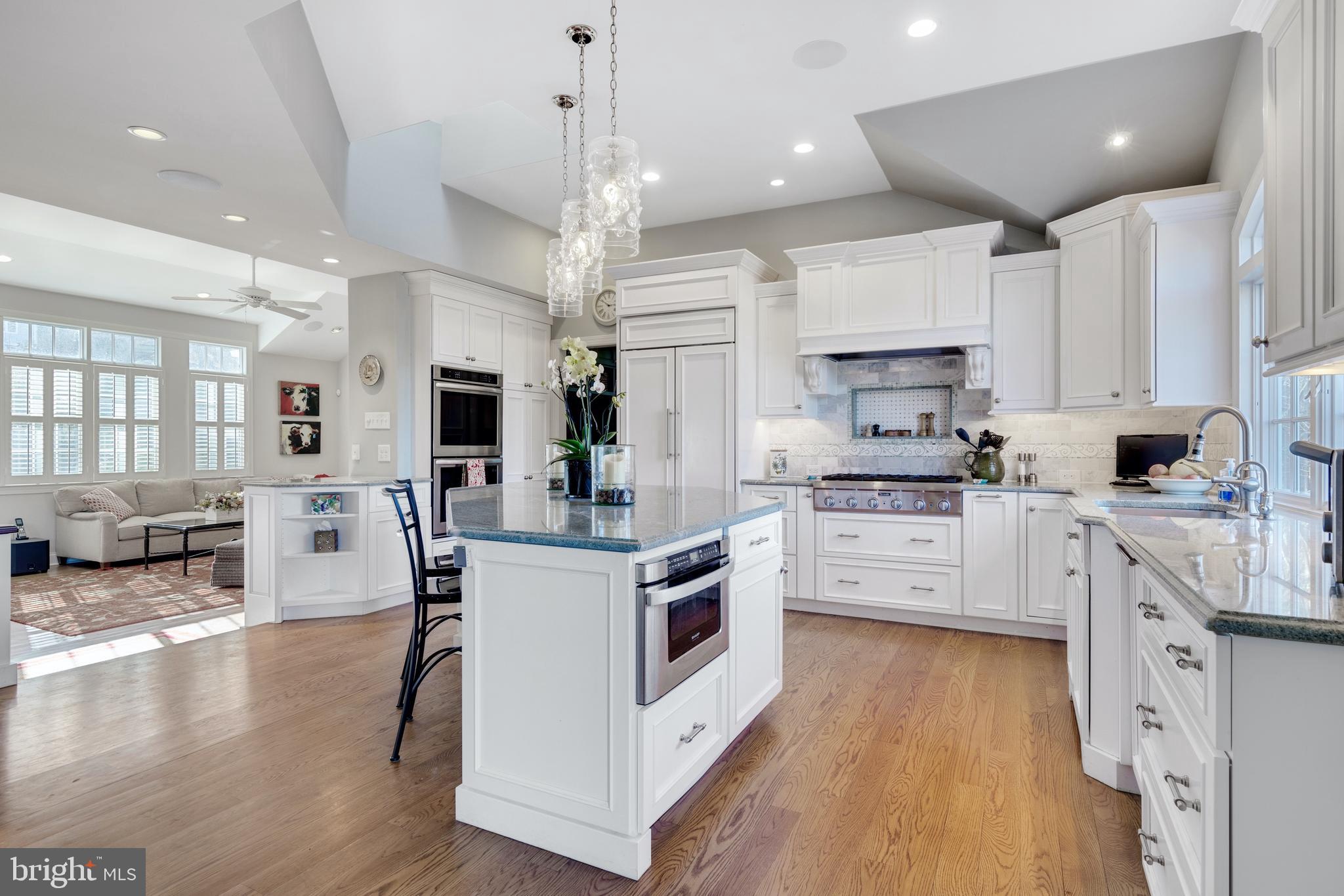 654 Malin Road Newtown Square, PA 19073 - Photo 4 of 34 Expanded Kitchen Opens to Family Room