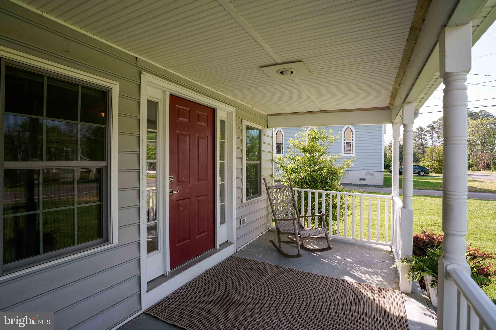6403 Bozman Neavitt Road Neavitt, MD 21652 - Photo 2 of 31 a view of a porch with chairs