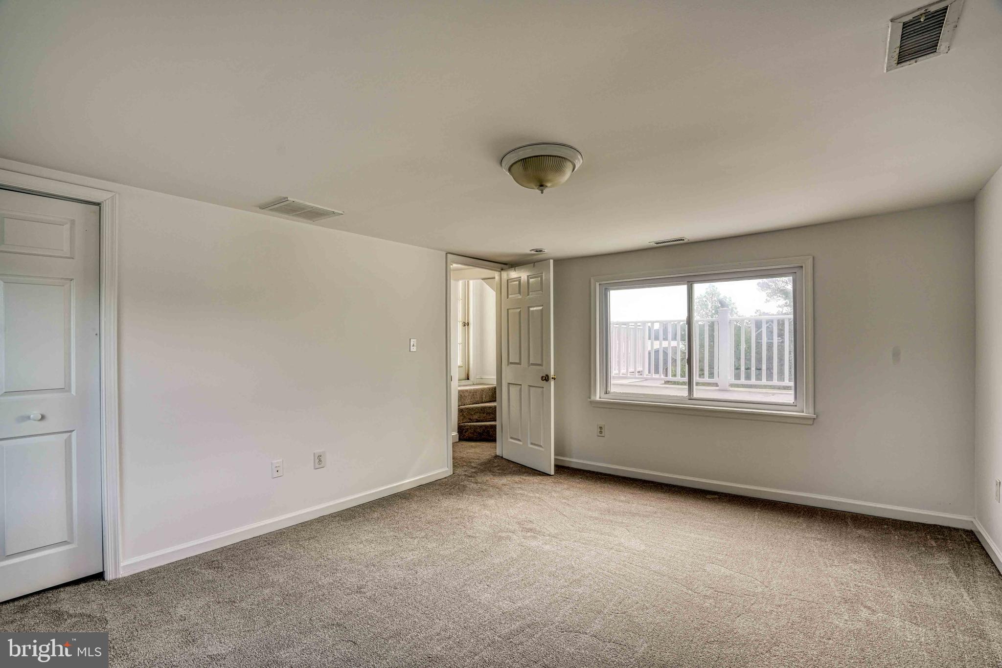 6403 Bozman Neavitt Road Neavitt, MD 21652 - Photo 23 of 31 a view of an empty room with a window