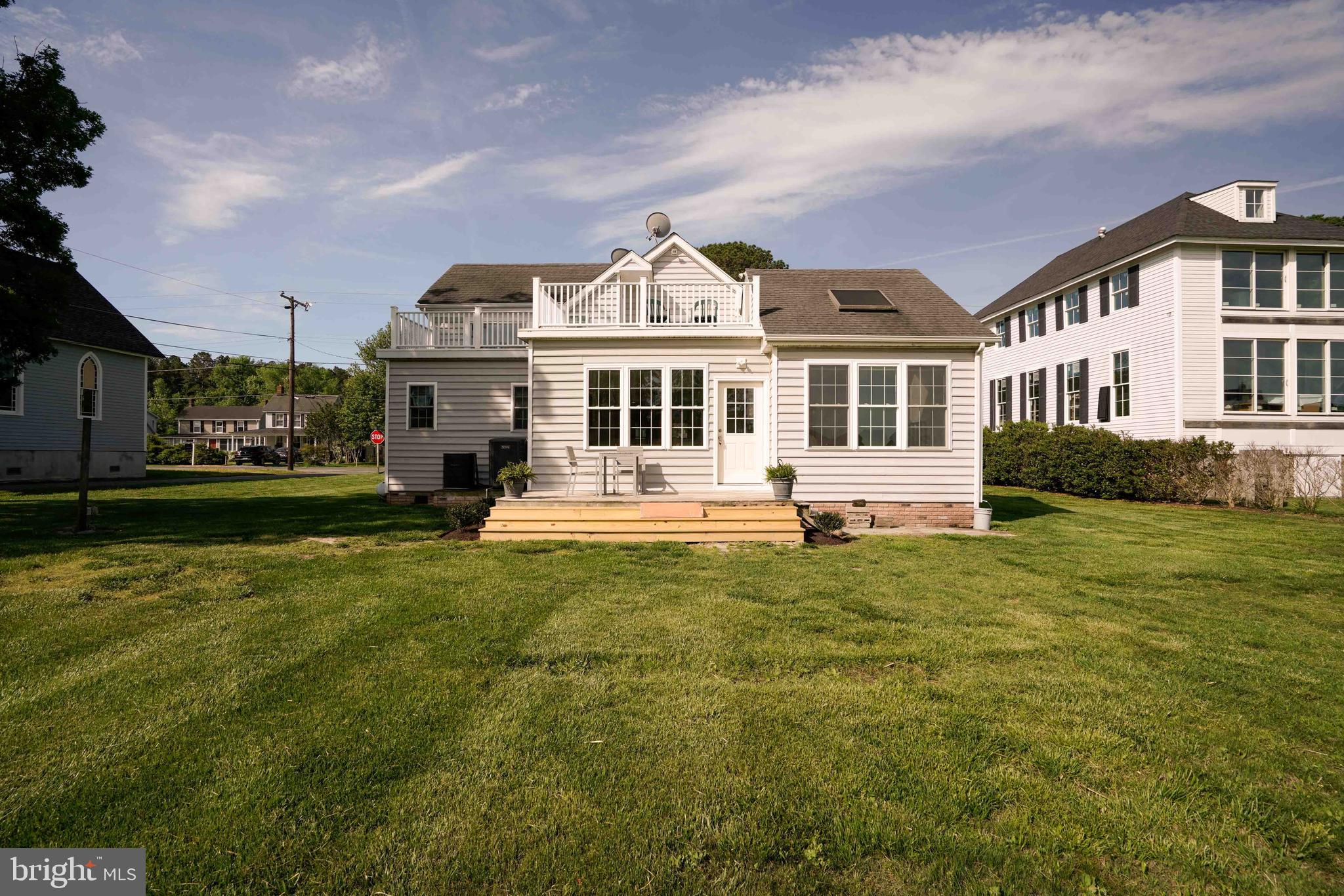 6403 Bozman Neavitt Road Neavitt, MD 21652 - Photo 28 of 31 a front view of a house with a garden