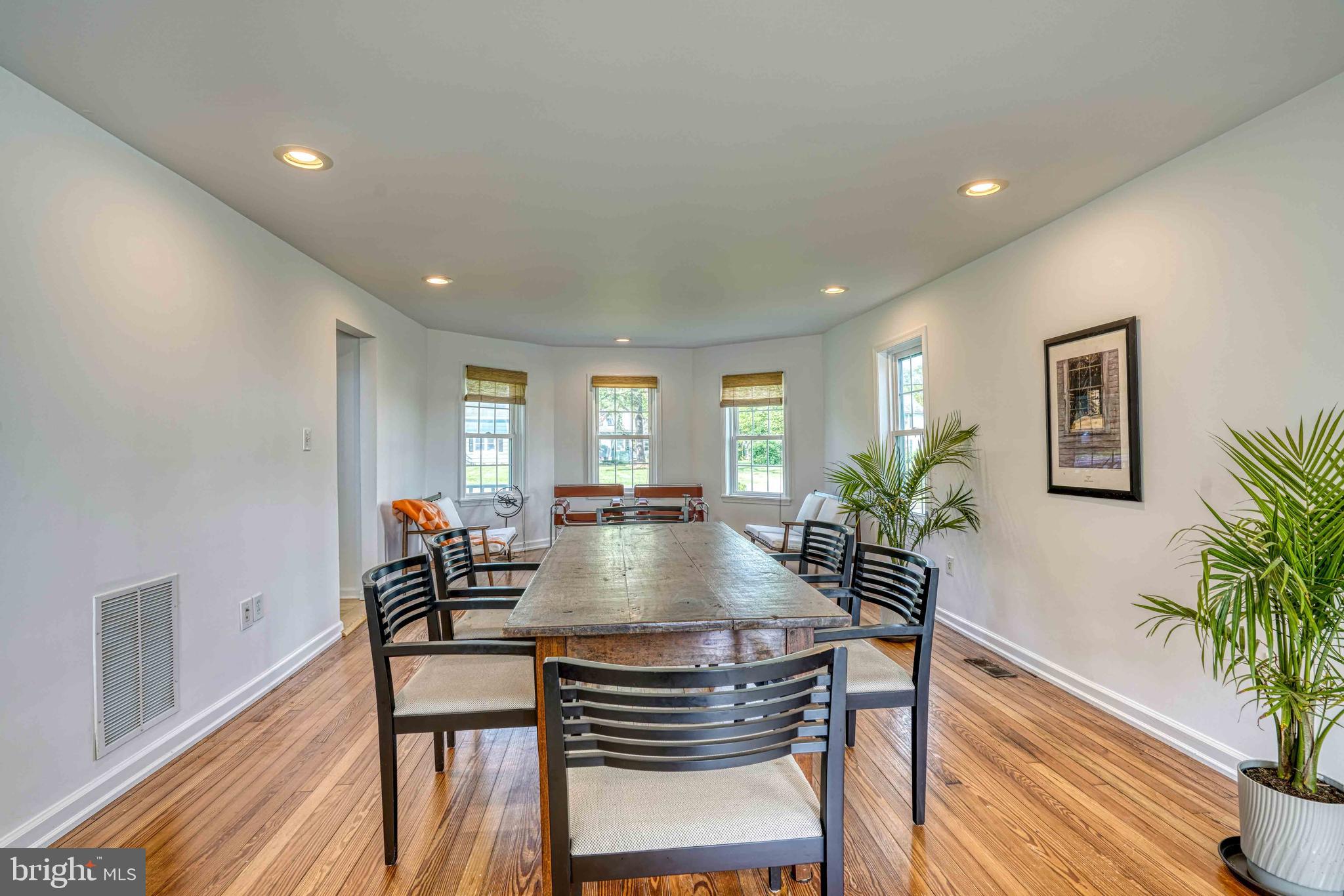 6403 Bozman Neavitt Road Neavitt, MD 21652 - Photo 7 of 31 a view of a dining room with furniture window and wooden floor