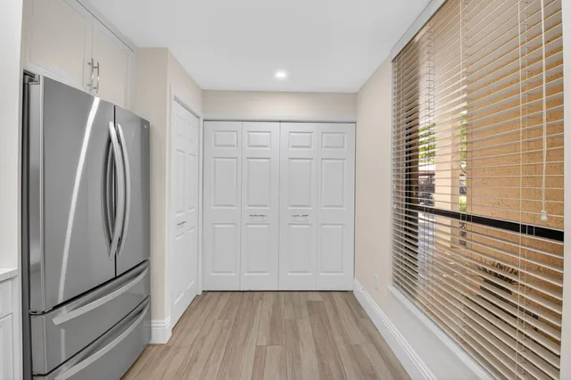 a kitchen with a sink stove and microwave