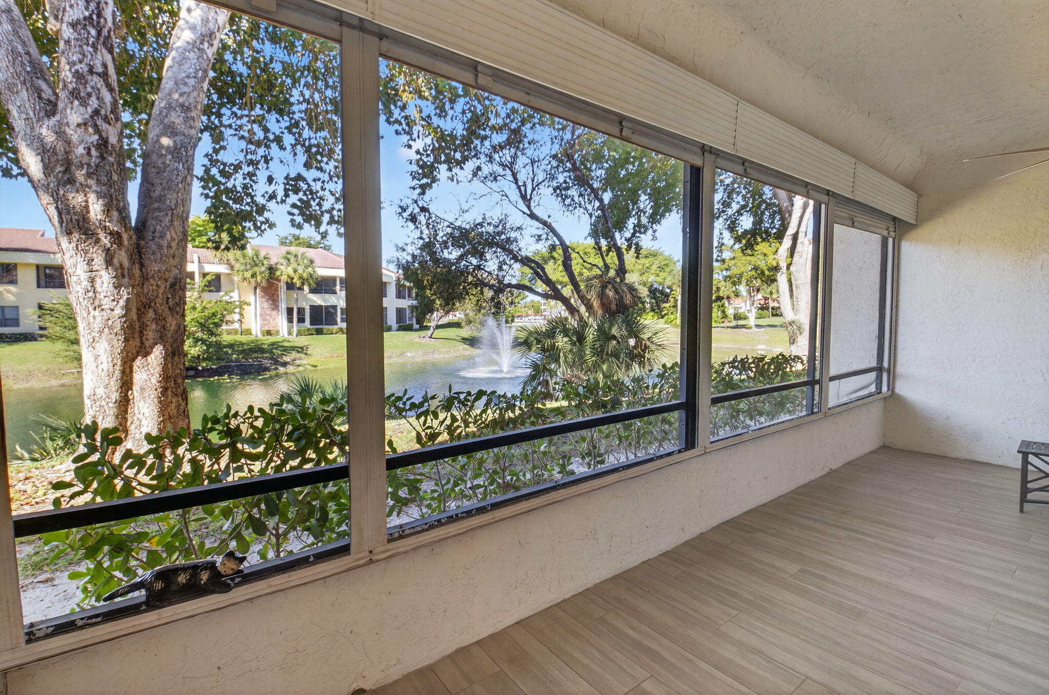 7484 La Paz Boulevard, Unit 103 Boca Raton, FL 33433 - Photo 4 of 50 TRANQUIL FOUNTAIN & LAKE VIEWS