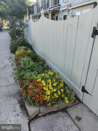 a view of a wooden fence