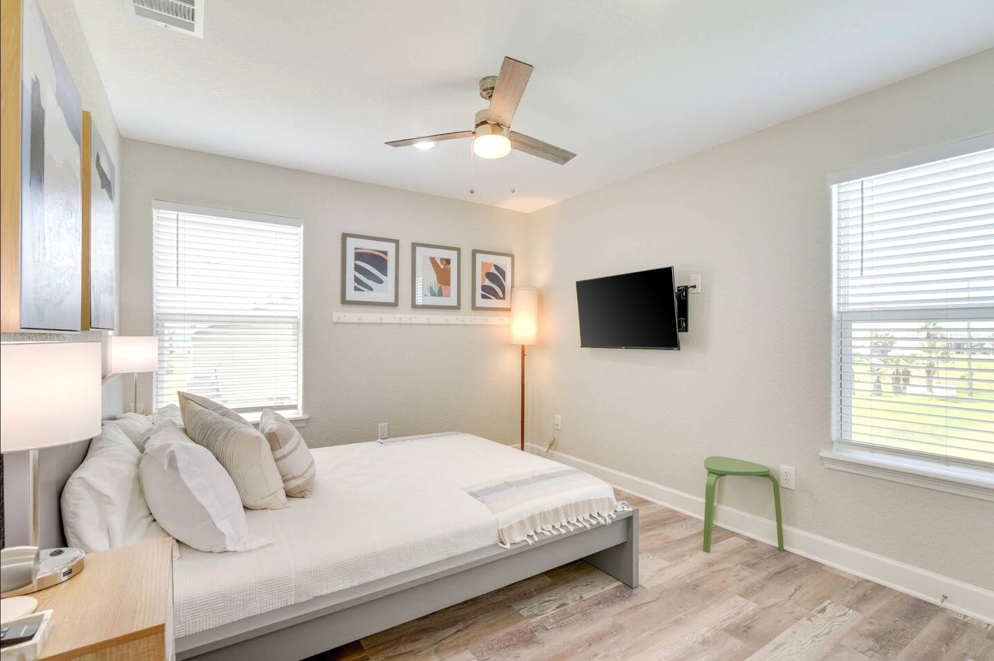 315 Murex Street Surfside Beach, TX 77541 - Photo 13 of 29 a bedroom with a bed and a flat screen tv