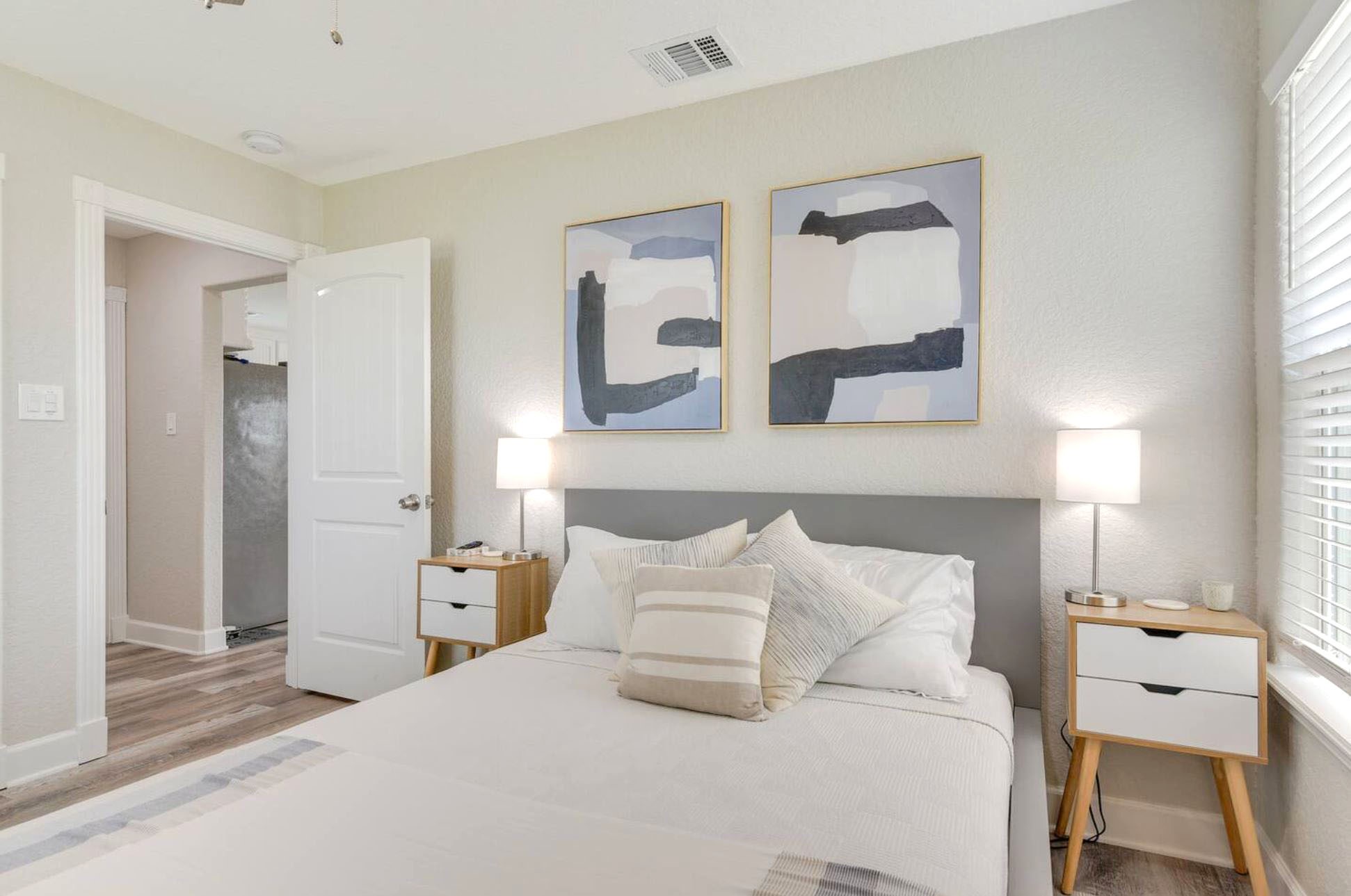 315 Murex Street Surfside Beach, TX 77541 - Photo 14 of 29 a bedroom with a large bed and a window