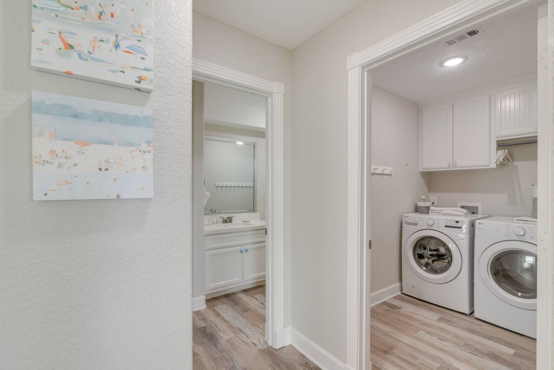 315 Murex Street Surfside Beach, TX 77541 - Photo 17 of 29 a view of a kitchen with washer and dryer