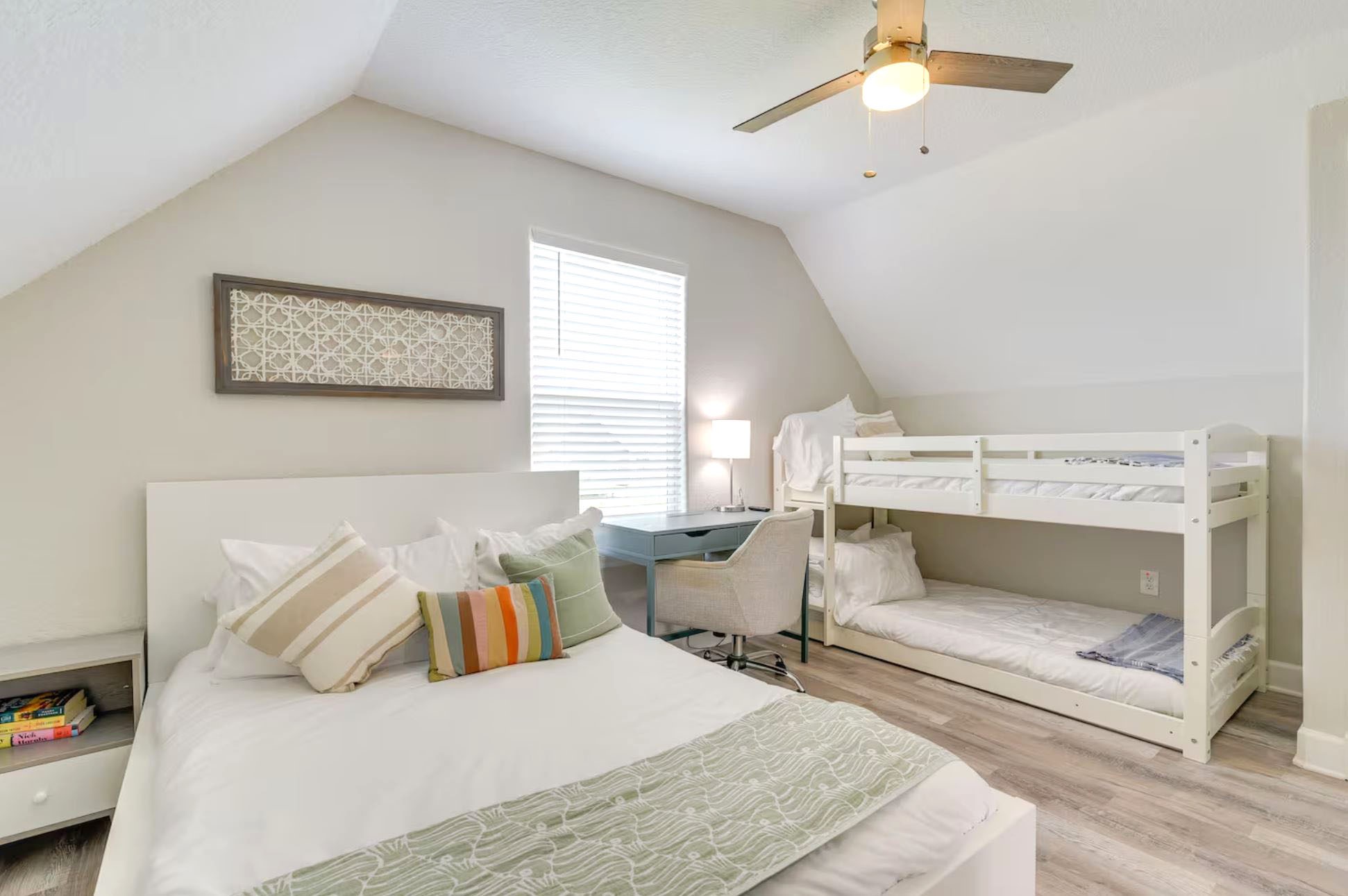 315 Murex Street Surfside Beach, TX 77541 - Photo 19 of 29 a bedroom with a bed and a window