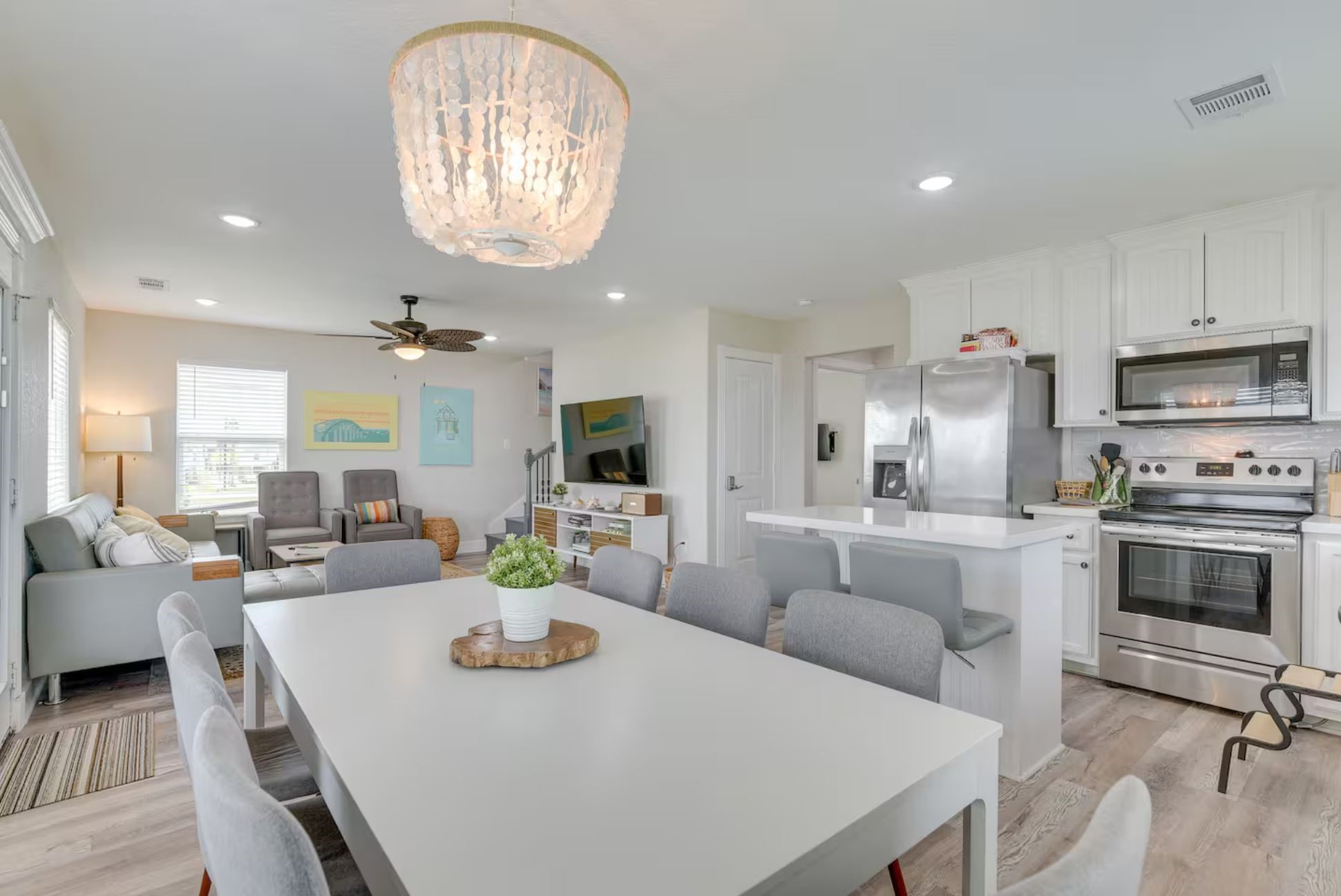 315 Murex Street Surfside Beach, TX 77541 - Photo 6 of 29 a view of a dining room with furniture and wooden floor