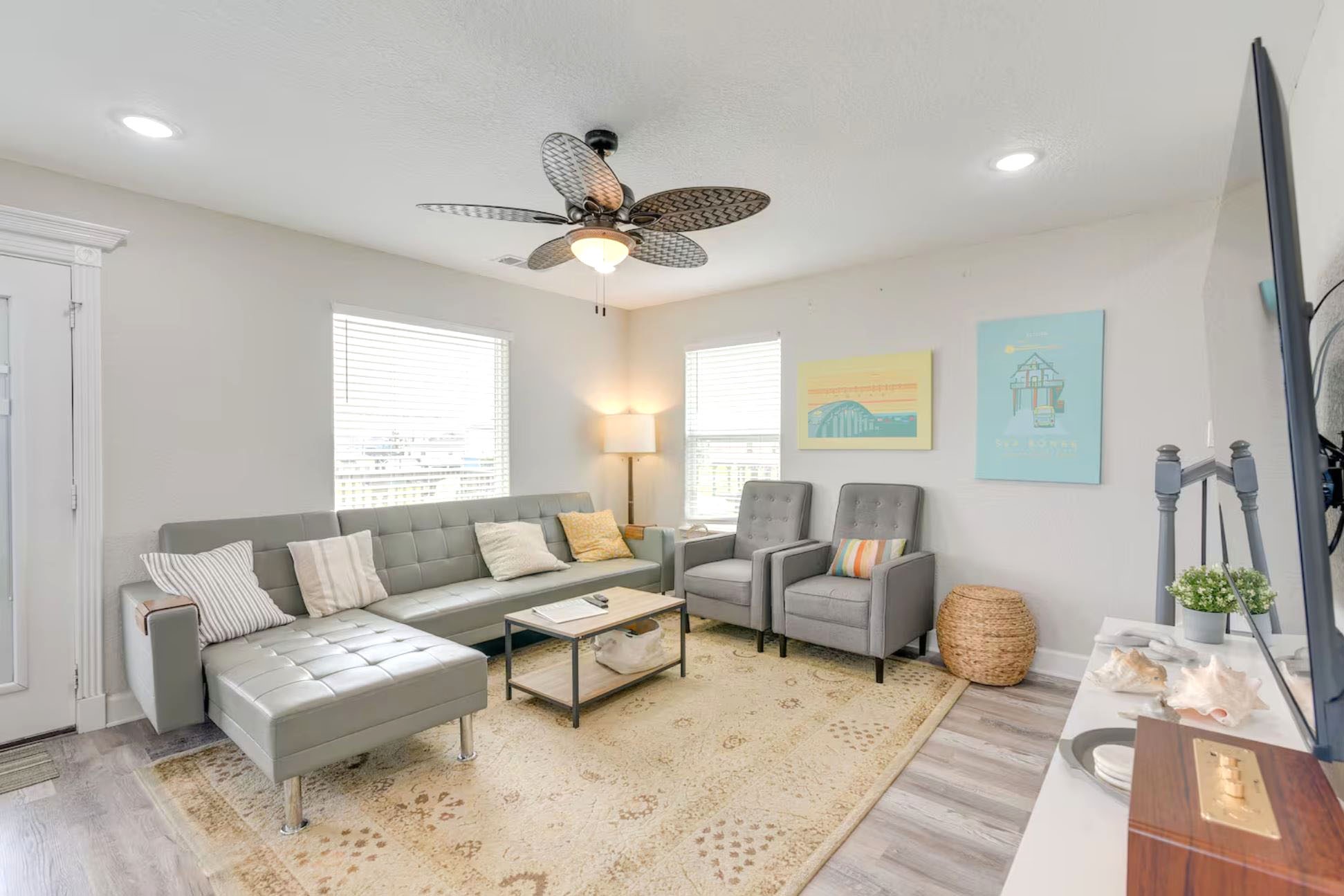 315 Murex Street Surfside Beach, TX 77541 - Photo 10 of 29 a living room with furniture and a large window