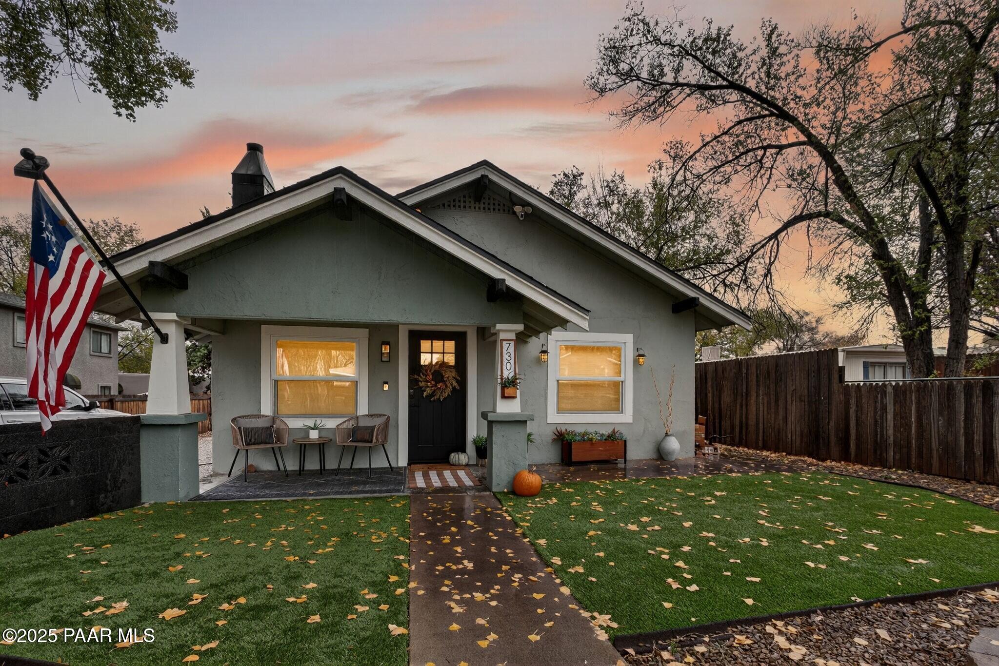 730 4th Street Prescott, AZ 86301 - Photo 2 of 37 a front view of a house with garden