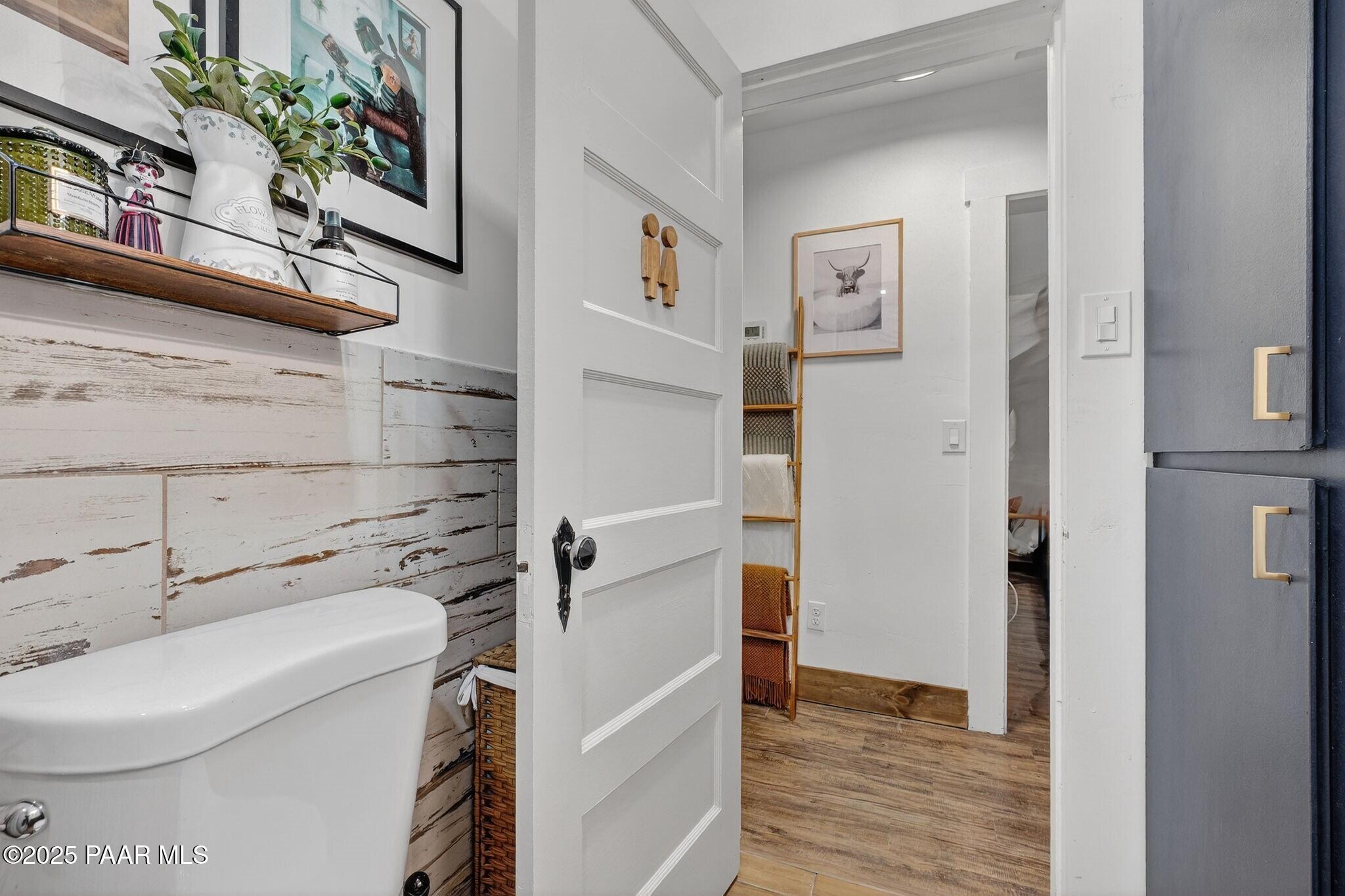 730 4th Street Prescott, AZ 86301 - Photo 25 of 37 a bathroom with a sink a toilet and shower