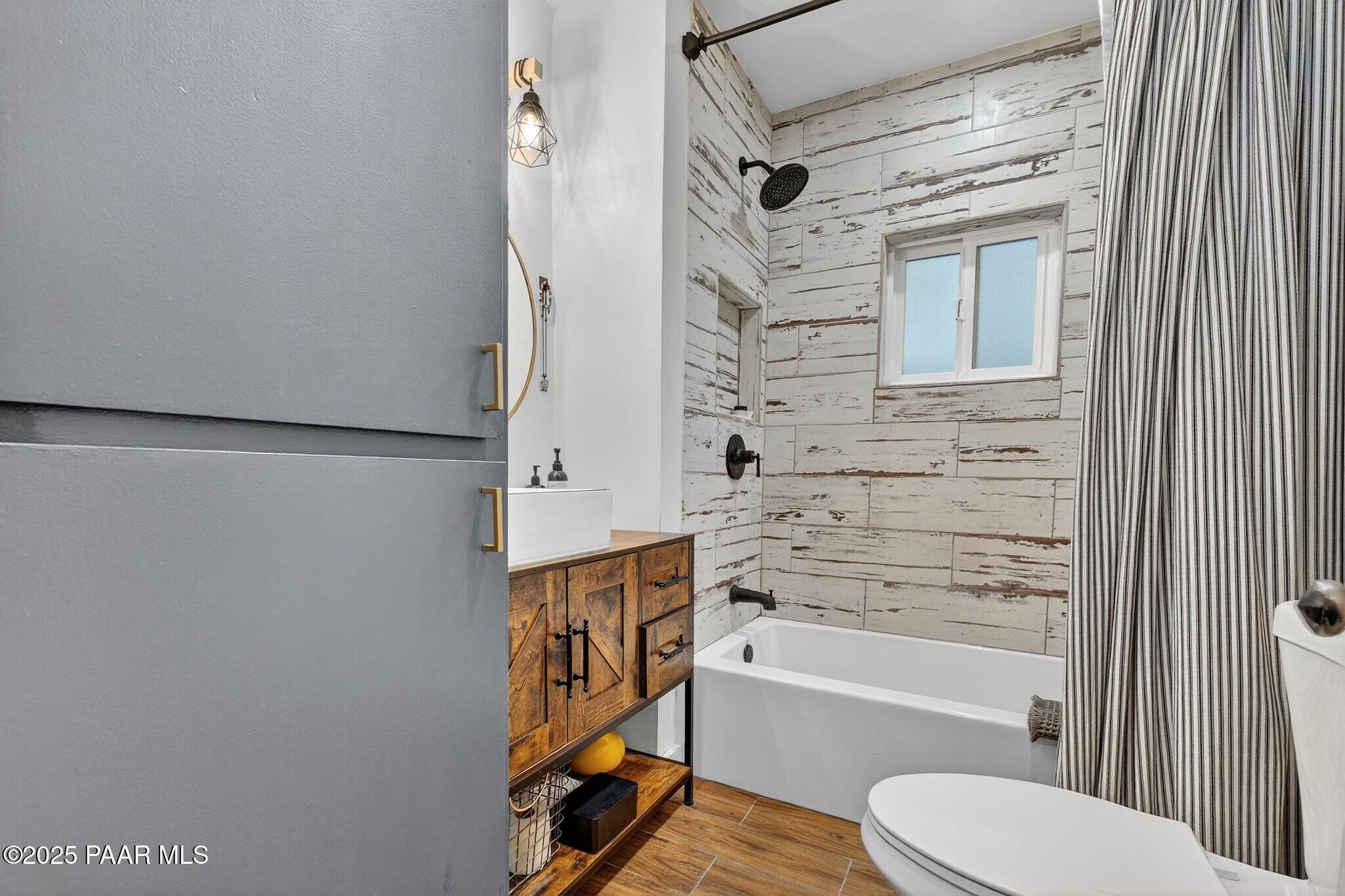 730 4th Street Prescott, AZ 86301 - Photo 26 of 37 a bathroom with a toilet and a bathtub