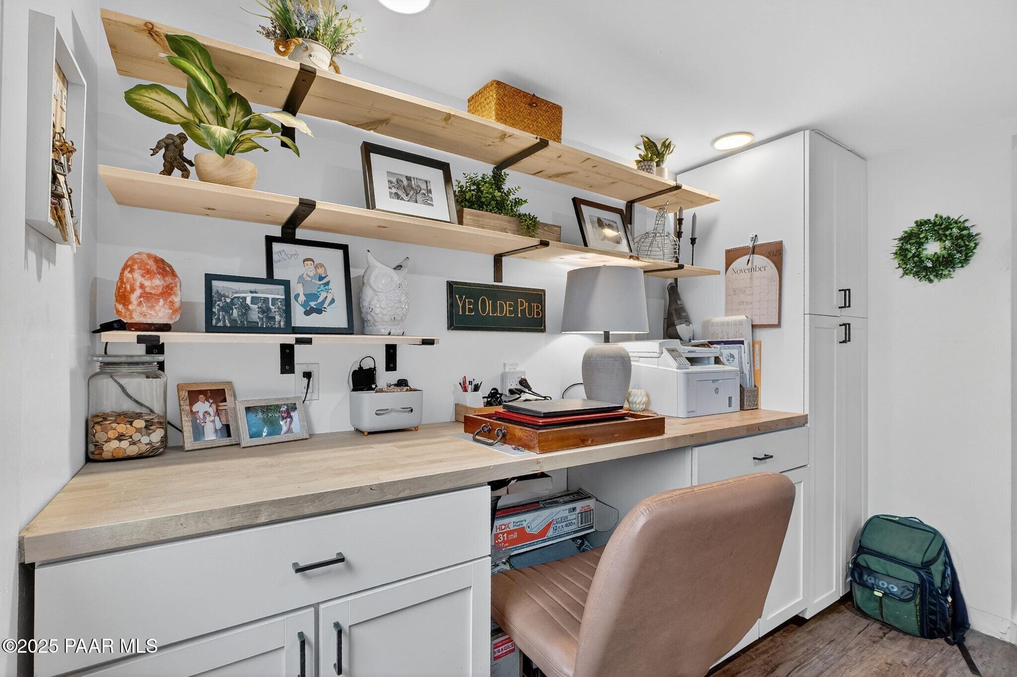 730 4th Street Prescott, AZ 86301 - Photo 29 of 37 a living room with furniture cabinets and window