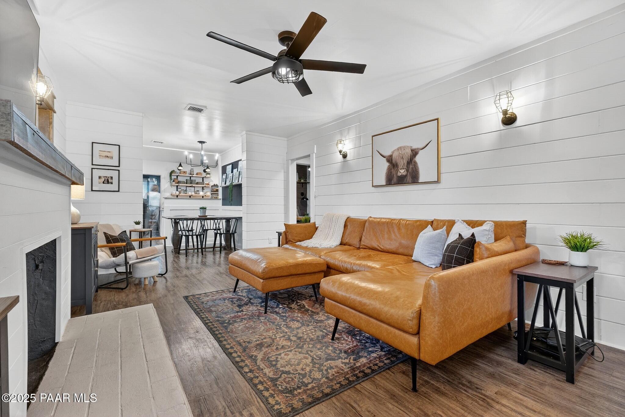 730 4th Street Prescott, AZ 86301 - Photo 8 of 37 a living room with furniture wooden floor and kitchen view