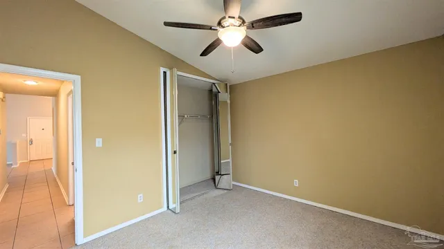 a bathroom with a toilet a sink and a mirror