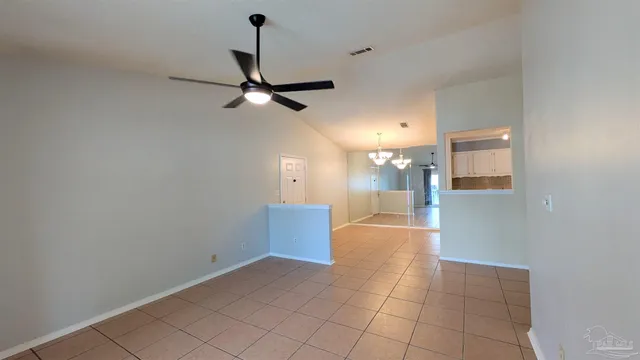 a view of a kitchen with a sink and a window