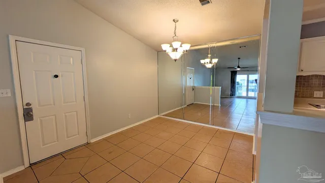 a view of a livingroom with a furniture