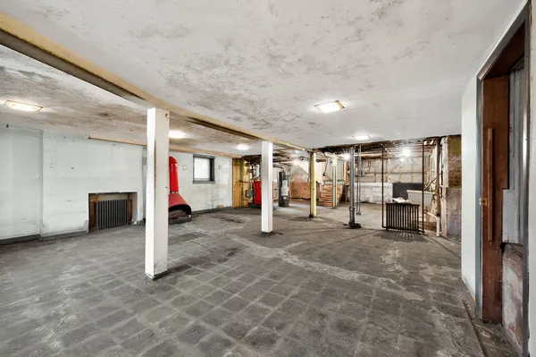 a view of a livingroom with walk in closet and bedroom