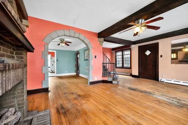 a view of hall way with furniture