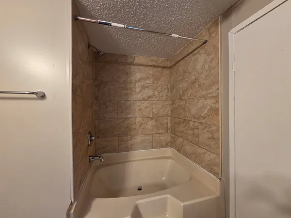a bathroom with a bathtub