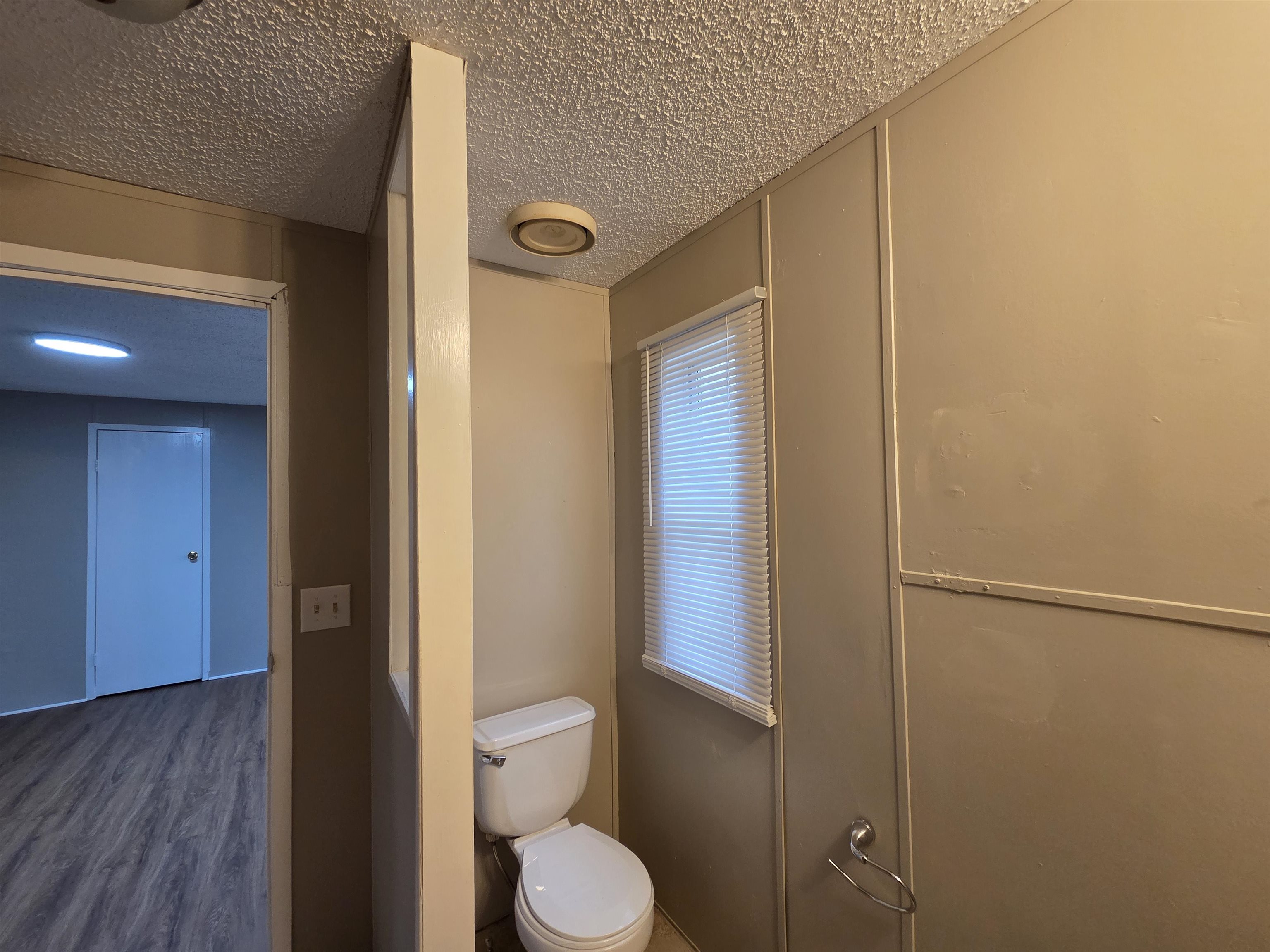2956 Lake Park Road Memphis, TN 38127 - Photo 19 of 25 a bathroom with a toilet and a shower