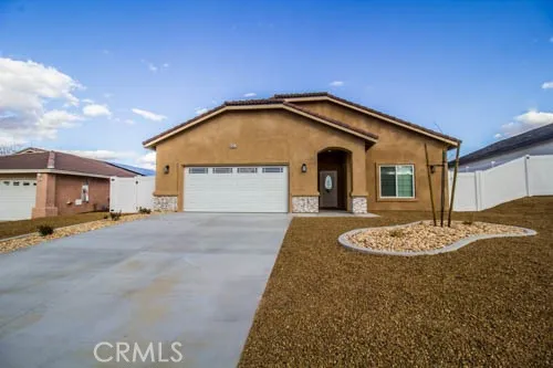 a front view of a house with entertaining space