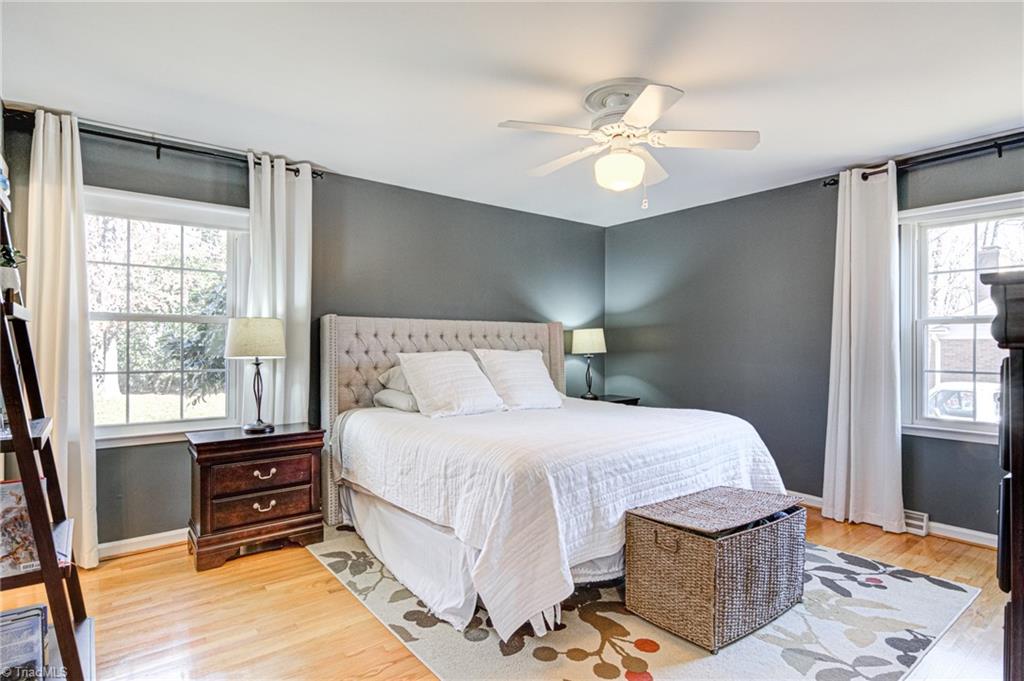 4516 Tower Road Greensboro, NC 27410 - Photo 16 of 26 Main/primary bedroom is spacious and comfortably handles a king-sized bed