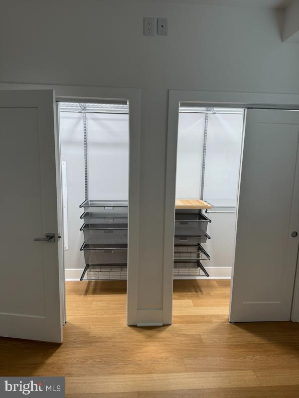 11 15th Street Northeast, Unit 3 Washington, DC 20002 - Photo 12 of 13 a view of a room with wooden floor and cabinet