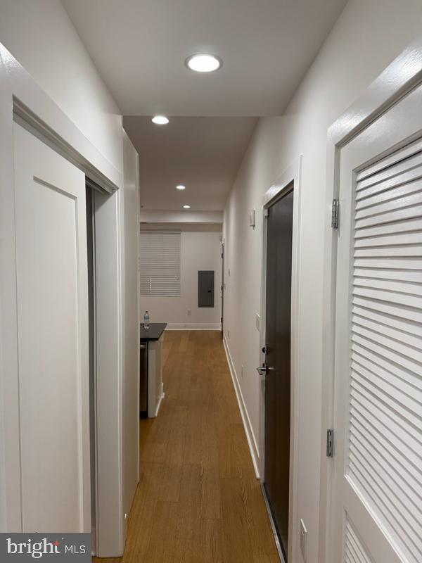 11 15th Street Northeast, Unit 3 Washington, DC 20002 - Photo 8 of 13 a view of a hallway with wooden shelves
