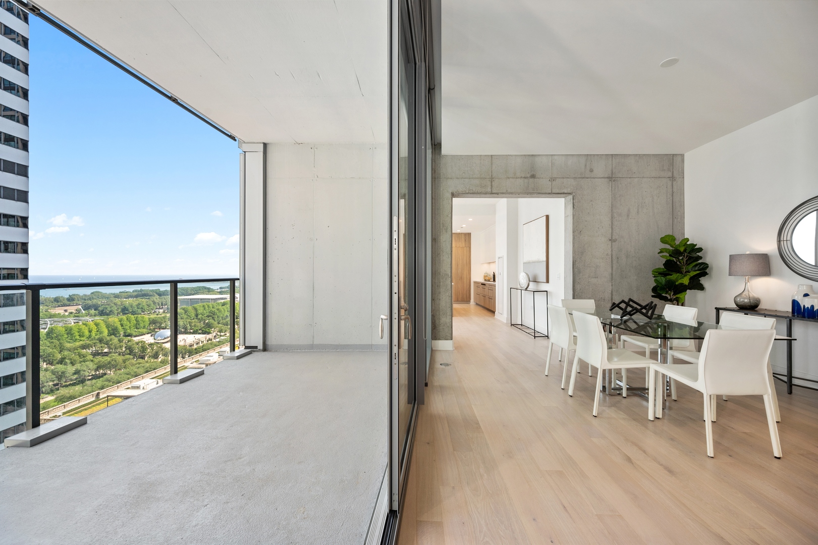 60 East Randolph Street, Unit 20D Chicago, IL 60601 - Photo 15 of 24 a view of a room with furniture and wooden floor