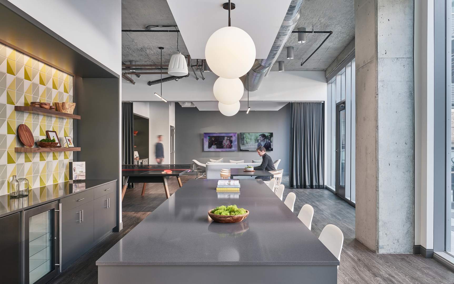 60 East Randolph Street, Unit 20D Chicago, IL 60601 - Photo 21 of 24 a kitchen with a refrigerator and a table