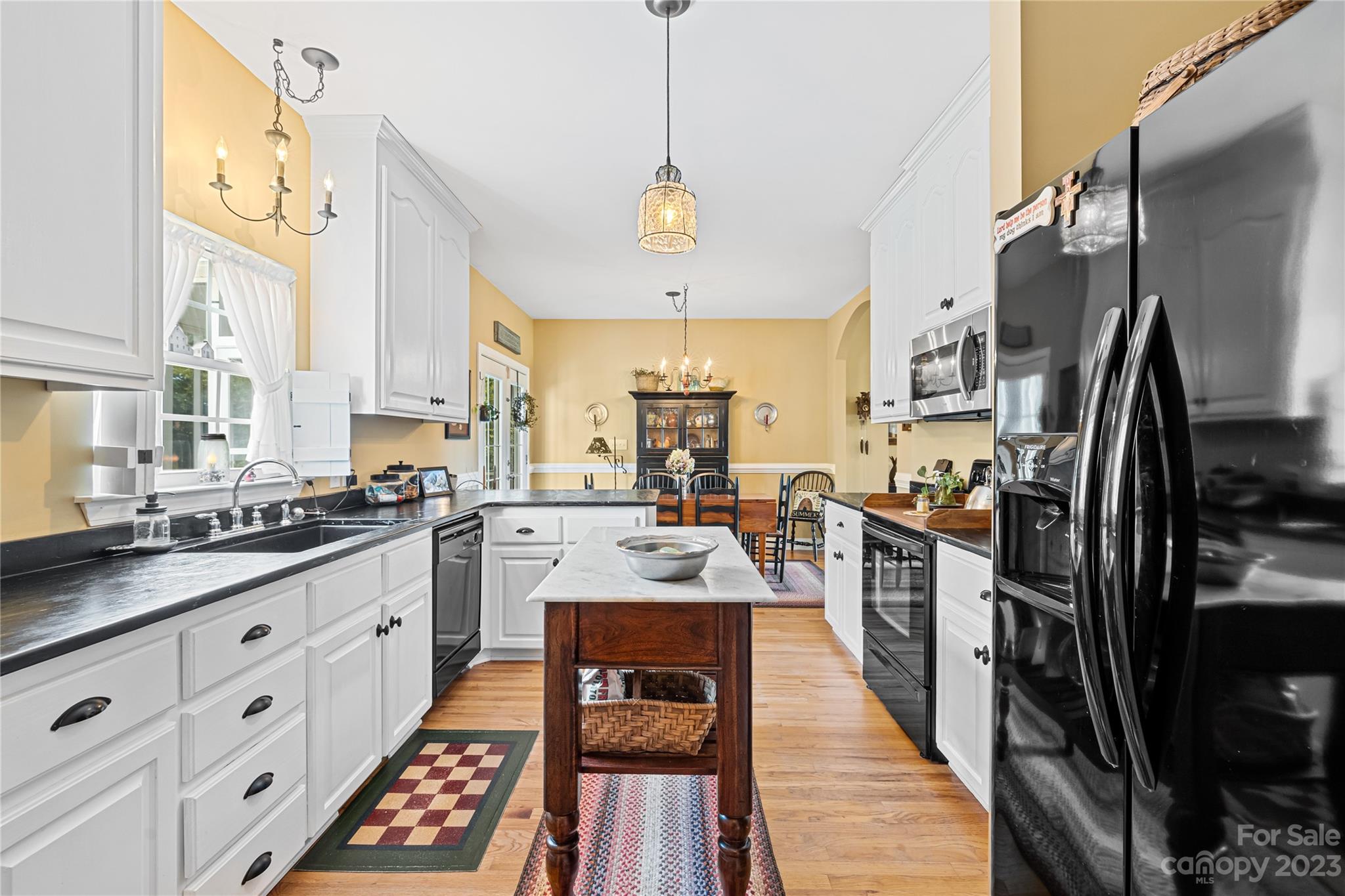 374 Owens Road Clover, SC 29710 - Photo 12 of 42 a kitchen with refrigerator a stove and a sink