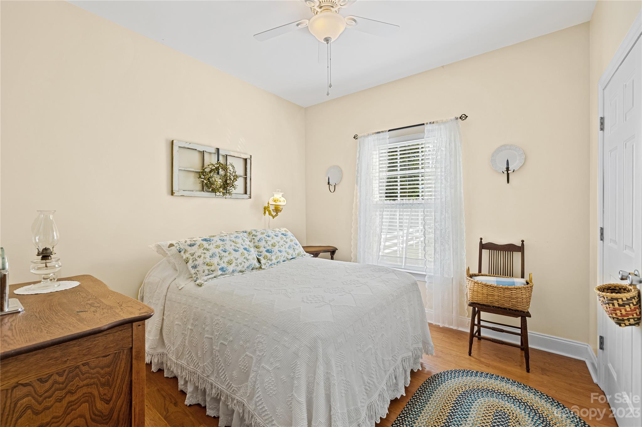 374 Owens Road Clover, SC 29710 - Photo 17 of 42 a bedroom with a bed and a table in it