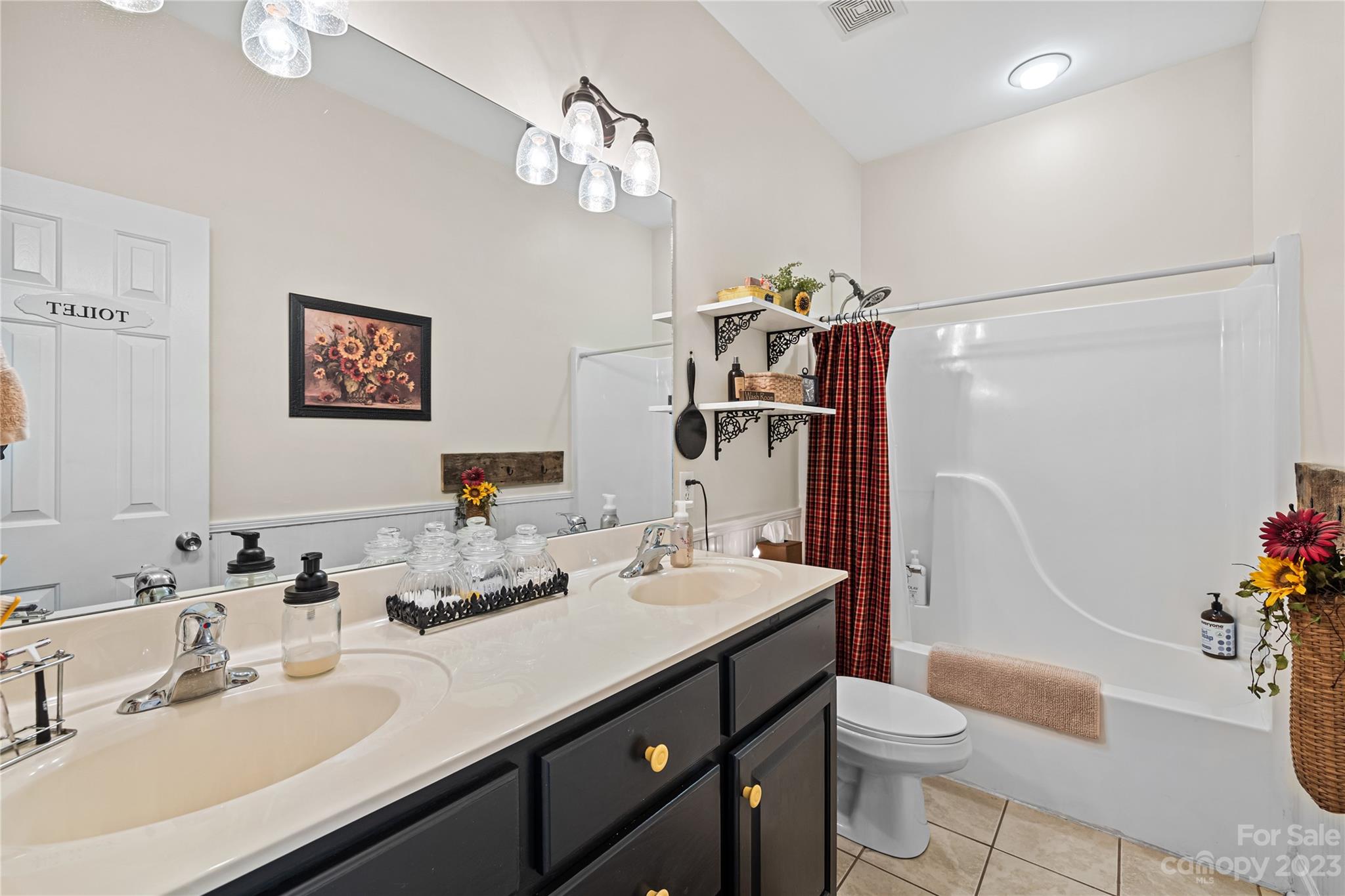 374 Owens Road Clover, SC 29710 - Photo 19 of 42 a bathroom with a sink vanity granite and toilet