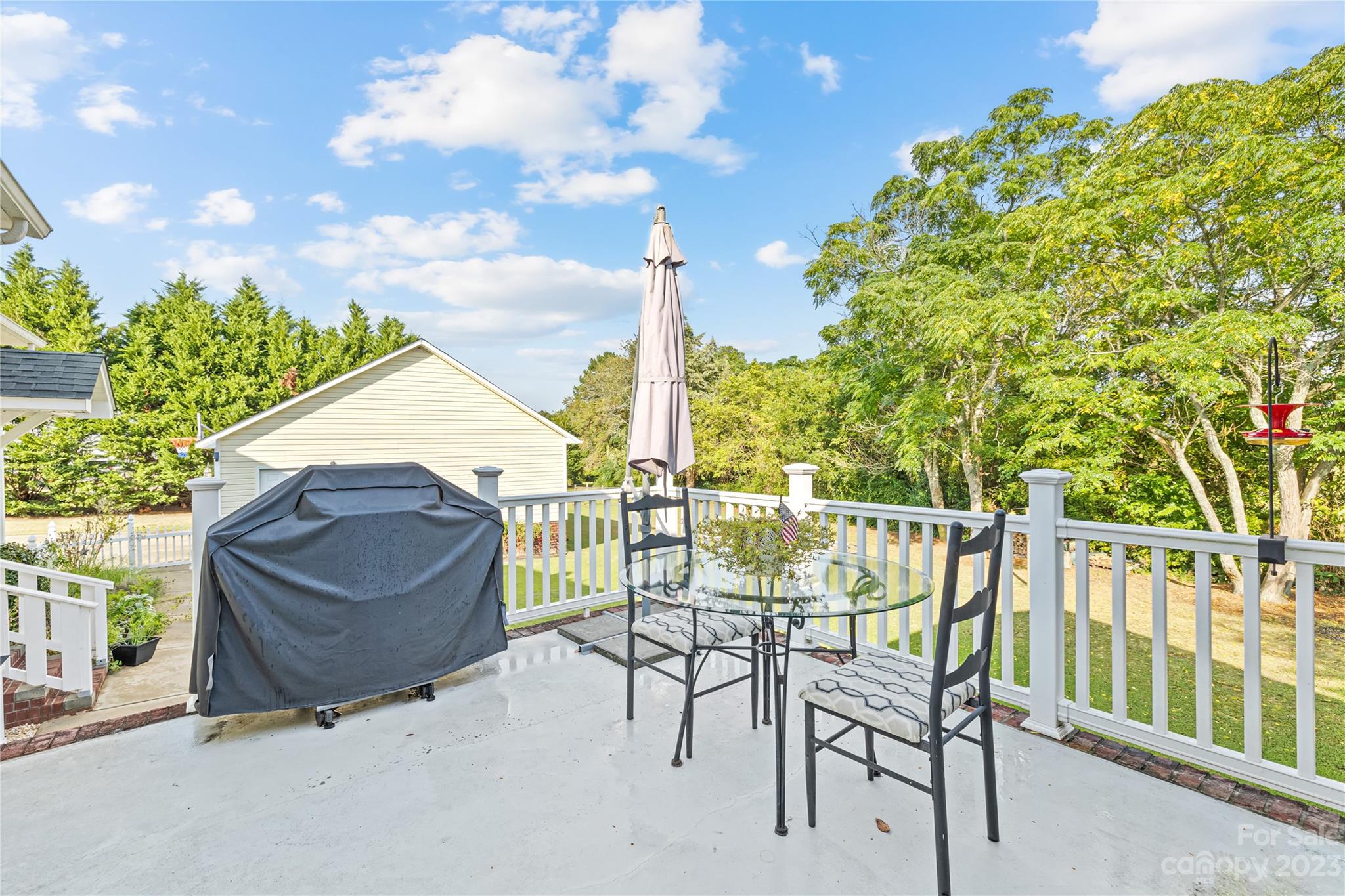 374 Owens Road Clover, SC 29710 - Photo 24 of 42 a view of a chairs and table in the patio