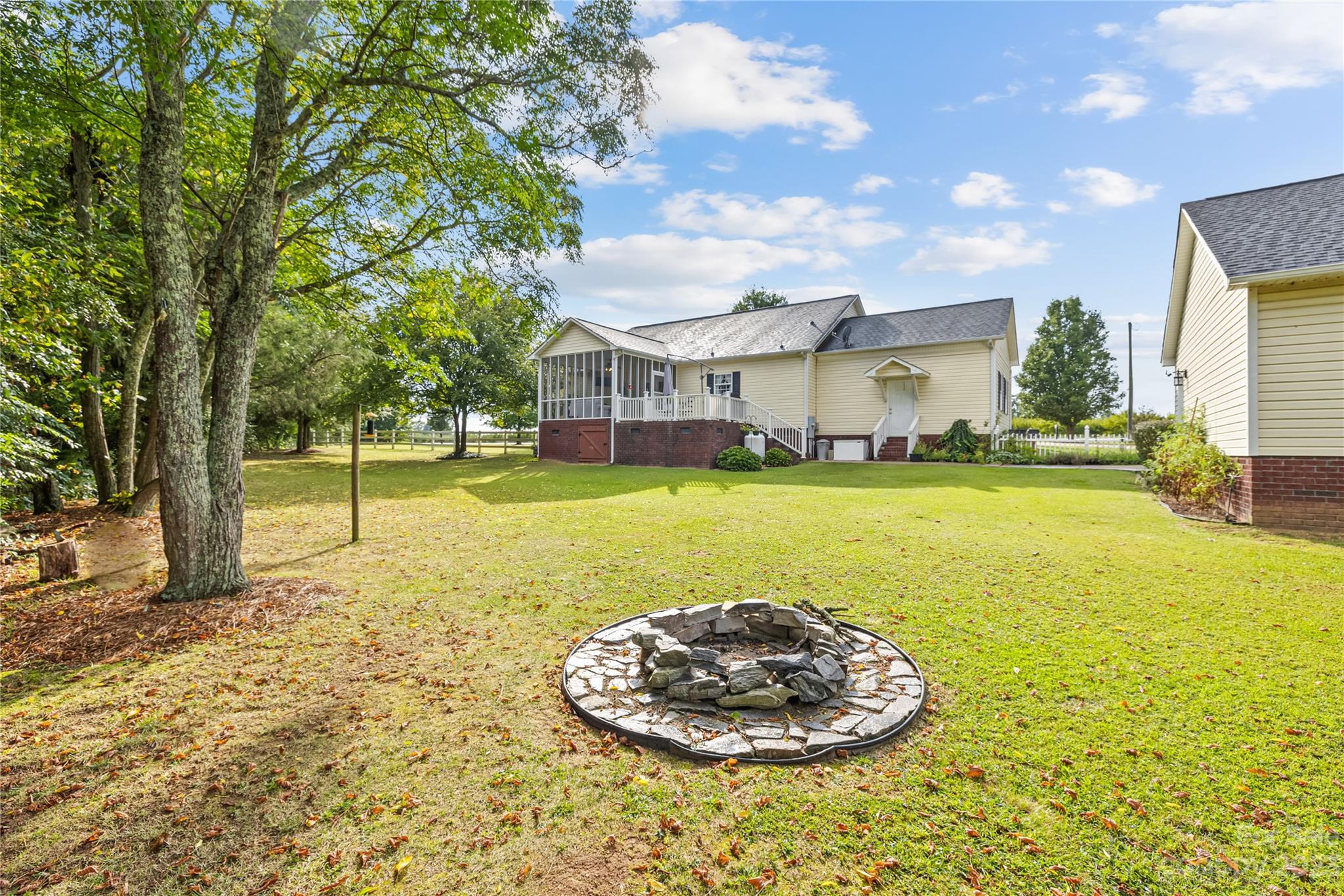 374 Owens Road Clover, SC 29710 - Photo 25 of 42 a view of a house with a yard and sitting area
