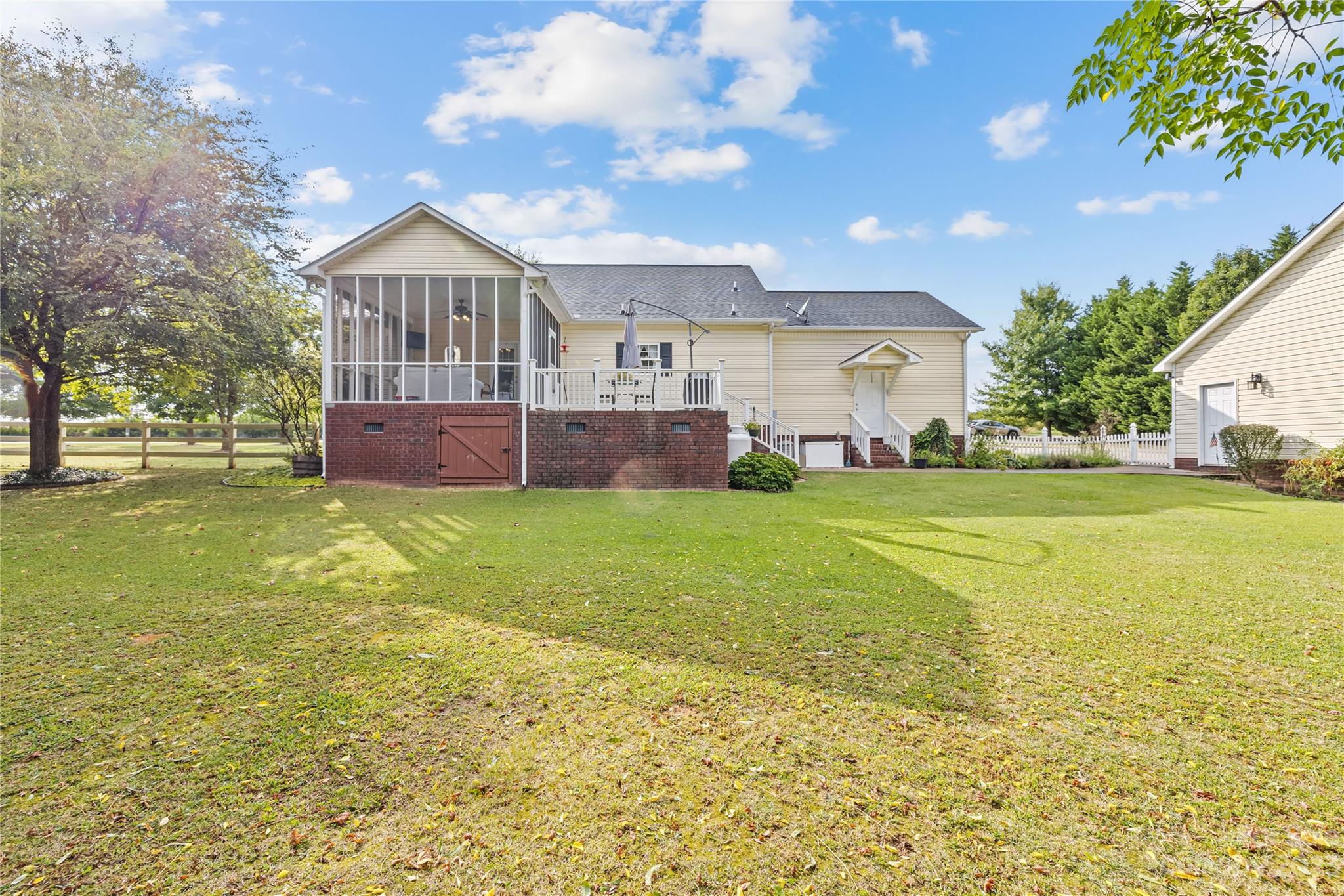 374 Owens Road Clover, SC 29710 - Photo 26 of 42 a front view of a house with garden