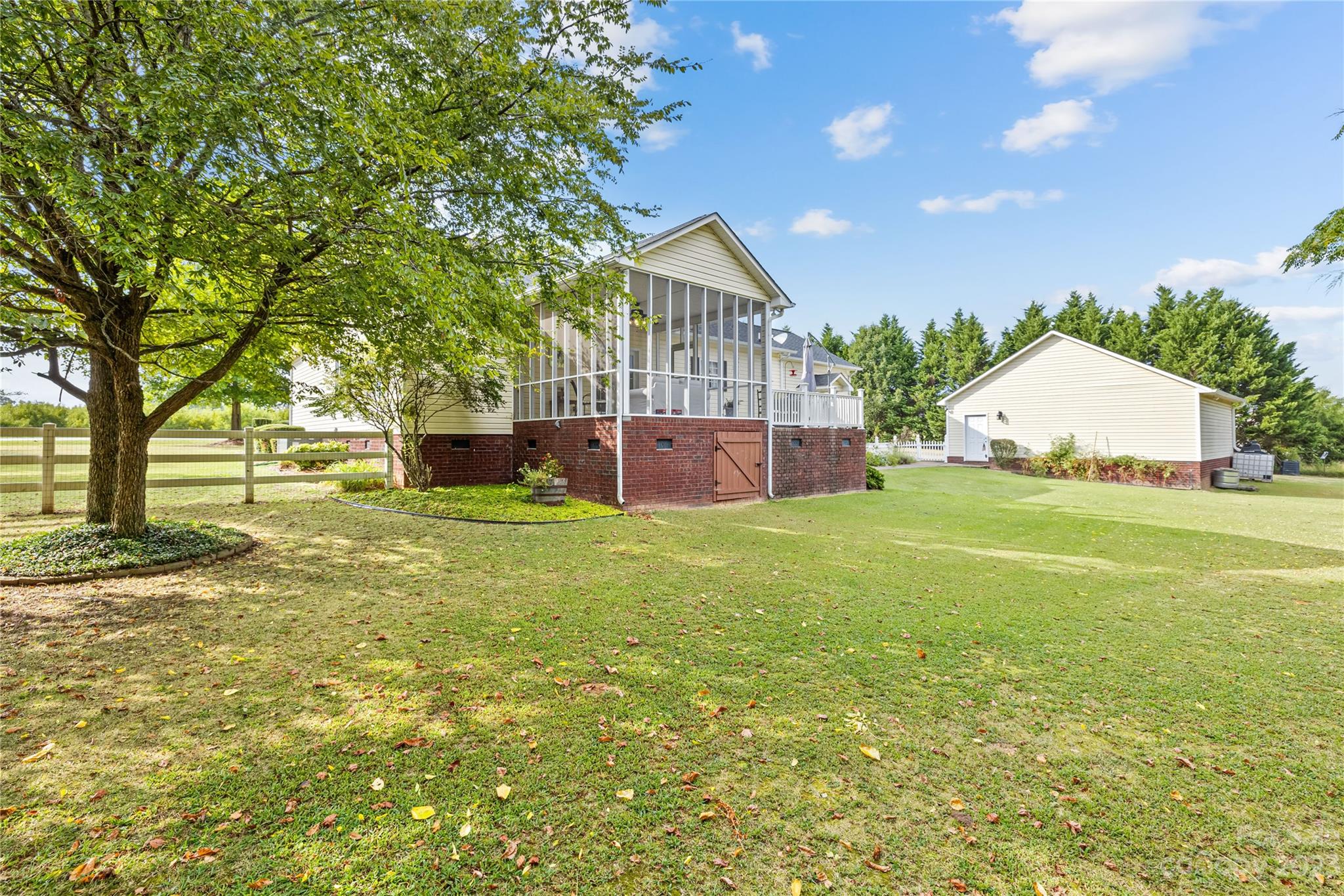 374 Owens Road Clover, SC 29710 - Photo 27 of 42 a view of a house with a big yard and large tree