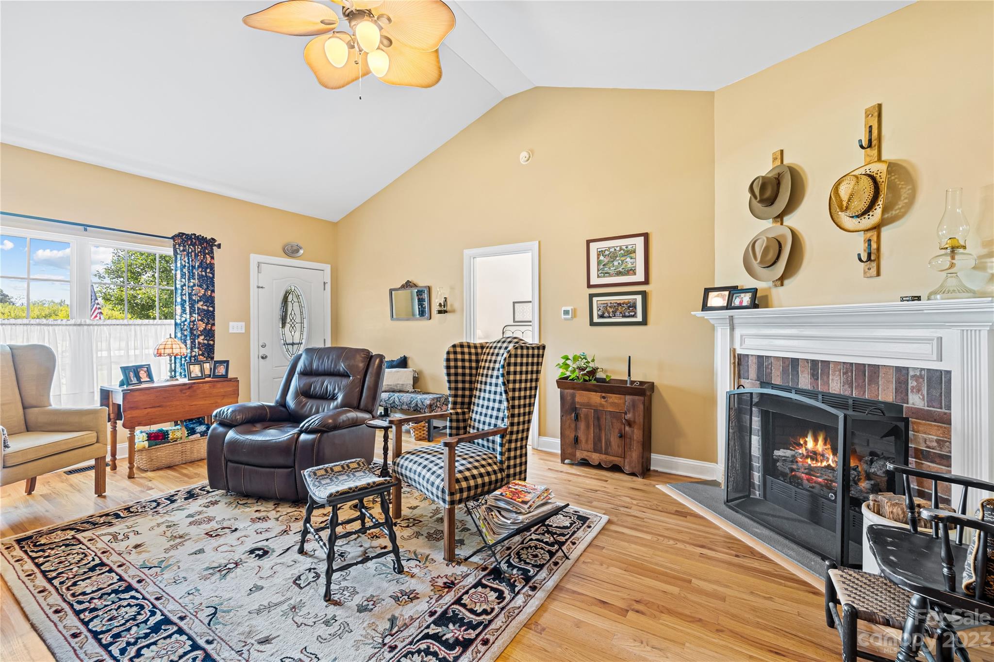 374 Owens Road Clover, SC 29710 - Photo 7 of 42 a living room with furniture and a fireplace