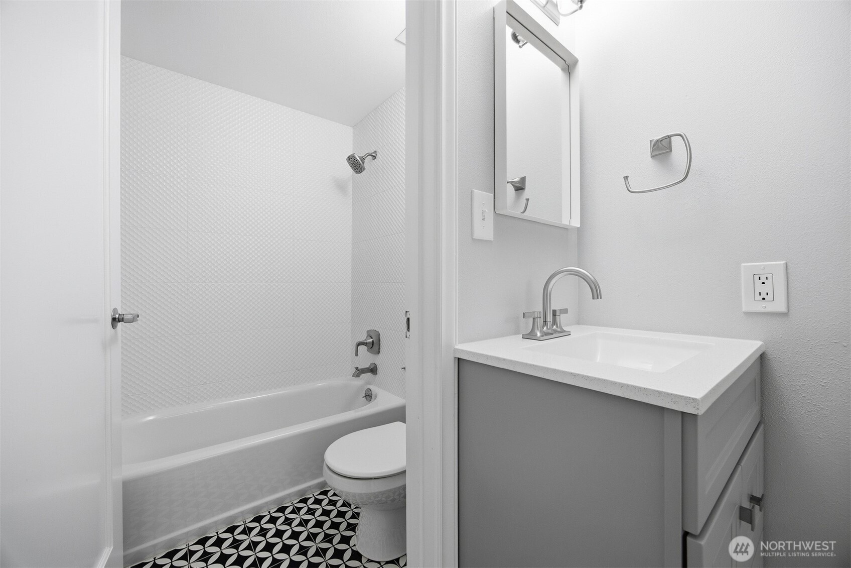 1201 11th Street, Unit 303 Bellingham, WA 98225 - Photo 20 of 34 a bathroom with a sink a toilet and shower