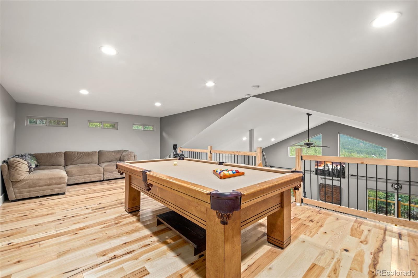 258 Upper Forest Road Idaho Springs, CO 80452 - Photo 23 of 48 a room with furniture pool table and flat screen tv