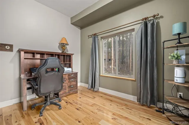 a view of a livingroom with furniture and windows